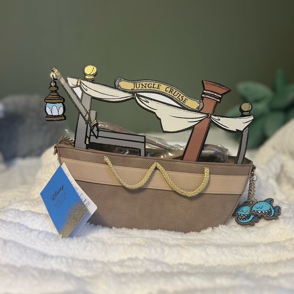 Disney Danielle Nicole Jungle Cruise, NEW Blue and Gold Tag